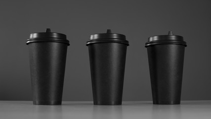 Three black cups of coffee. Coffee cup. 