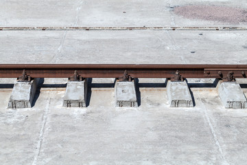 Rusty rail on concrete sleepers