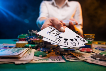 Fototapeta premium Casino player, winning combination, poker and gaming business. Concept of online gaming business and casino.