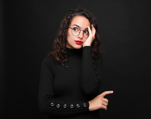 young pretty woman feeling bored, frustrated and sleepy after a tiresome, dull and tedious task,...