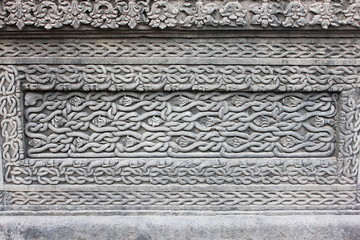 Carved design on the outer walls of Shiva temple in Ahilyabai Holkar fort, Maheswar, Khargone, Madhya Pradesh, India