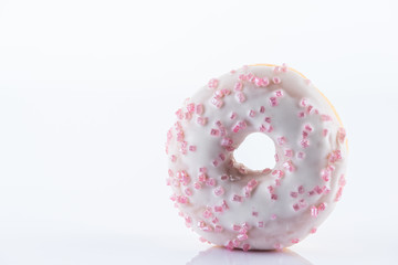 Single White Chocolate Donut or Doughnut. Studio Photo on White Background, Close Up view