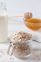 oatmeal groats in a glass jar