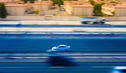 car driving in fast speed on road