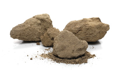 Dirt, soil chunks and pile isolated on white background