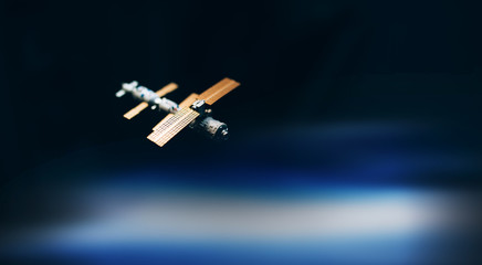 Space satellite orbiting the blue planet