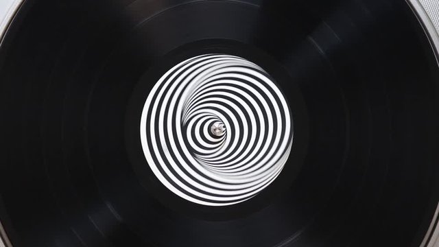 Black vinyl record on a turntable