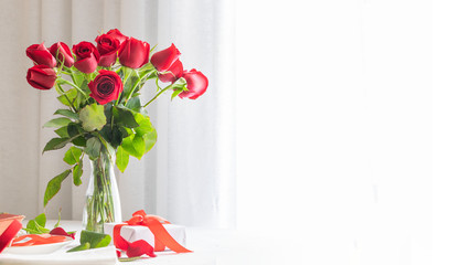 Beautiful red rose bouquet on white background. Perfect gift for Saint Valentines day, anniversary o birthday .