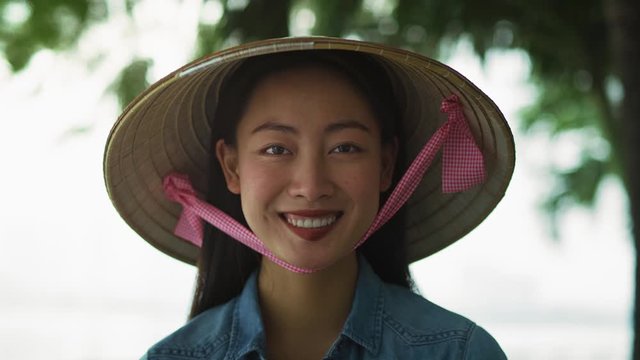 Handheld video shows of Vietnamese young woman. Shot with RED helium camera in 8K
