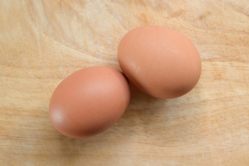 hen egg put on wood cutting board in kitchen prepare cooking