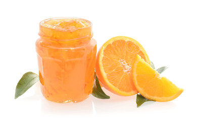 Orange jam in glass jar with fresh cutted fruits isolated on white