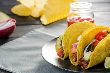 Homemade hard-shell tacos. Corn tortillas with a filling