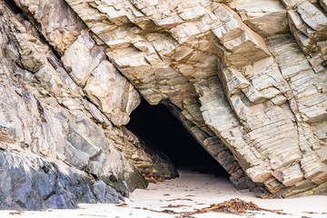 The beach and caves at Maghera Beach near Ardara, County Donegal - Ireland.