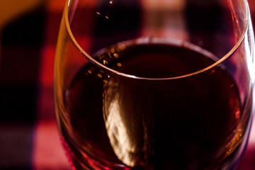 Glass of red wine macro close up