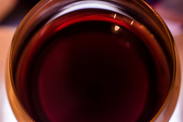 Glass of red wine macro close up