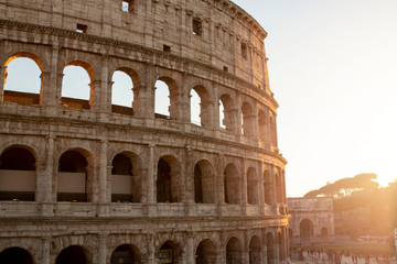 Colosseum at sunset in Rome, Italy. Ancient Roman Colosseum is one of the main tourist attractions in Europe. View of Colosseum in Rome during sunset.
