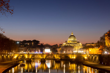 Fototapeta premium Night view of the Basilica St Peter Cathedral in Rome, Italy. Wonderful view of St. Peter's Cathedral at sun set.