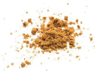 Natural unrefined brown sugar on white background