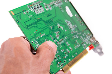 Left hand delivering old antique computer card