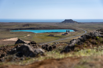 Blue lake by the forgotten factory in Iceland