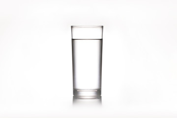 Close-Up Of Drinking Water In Glass Against White Background