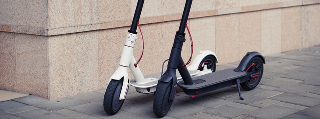 Modern electric scooter parking on the street.