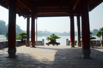 Beautiful Bonsai plant under the oriental pavilion at Hanoi.