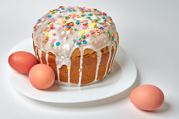 Easter cake panettone sweet bread kulich with raisins and eggs