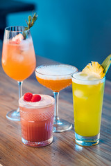 Selection of alcoholic cocktails on a table.