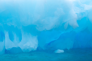 Iceberg closeup, Paradise Harbor, also known as Paradise Bay, behind Lemaire and Bryde Islands in Antarctica.