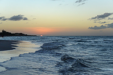 Sunset on the beach of Atlantic Ocean, Cuba