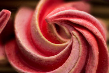 Macrophotography of meringue. Multicolored waves of cream