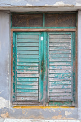 Fototapeta na wymiar Old green door of a house in Havana, Cuba