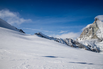 snow covered peaks in the Swiss Alps Matterhorn glacier paradise