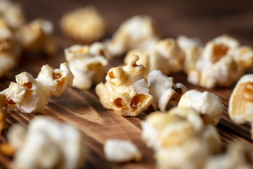 Popcorn flakes on a wooden background