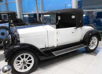  beautiful white retro car on display