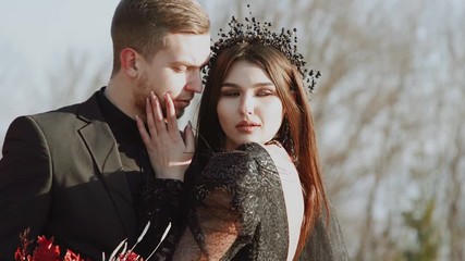 Gothic wedding. Bride and groom in black. Love in black.