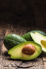 Fresh avocado on rustic wooden table - Close up