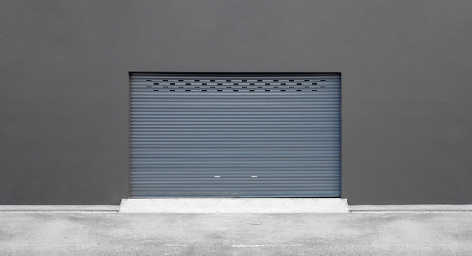 street wall background. roller shutter door and concrete floor outside factory building for industrial