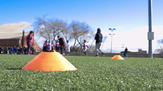 unrecognizable children's rugby tournament, unfocused view