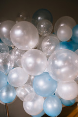 white and blue balloons photo wall birthday decoration