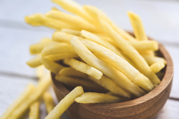 Fresh french fries in wooden bowl delicious Italian meny homemade ingredients - Tasty potato fries for food or snack