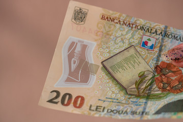 Woman hand giving money like bribe or tips isolated . LEI currency banknotes close up. Reward for...