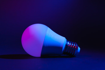 Smart LED lamp, economical and durable with the ability to adjust color and brightness. Stock photo...
