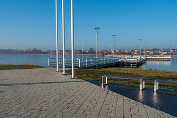 A large pier on a small lake in the city of Znin