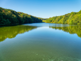 The treelined Linacre Lower Reservoir in Derbyshire
