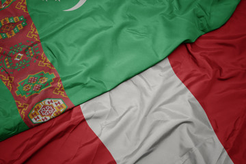waving colorful flag of peru and national flag of turkmenistan.