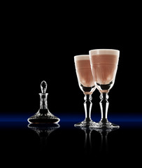 Whisky Flip cocktail on a black background.