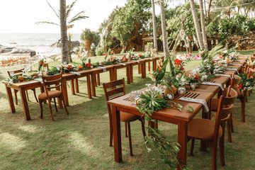 Fototapeta na wymiar Luxury wedding decoration in the garden. Concept of tropical wedding, Sri Lanka