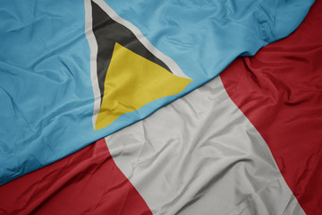 waving colorful flag of peru and national flag of saint lucia.